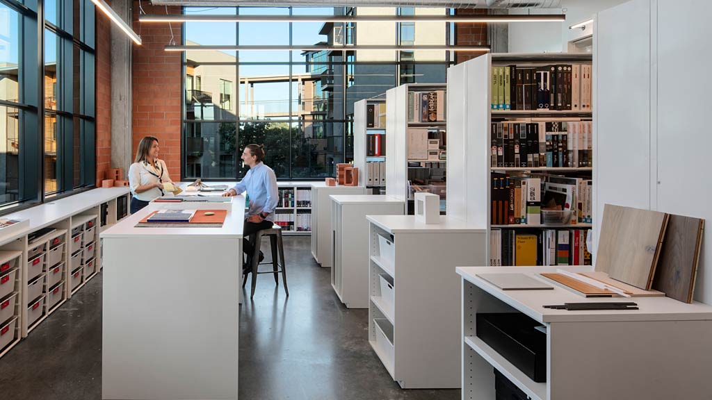 A man and a woman in an office.